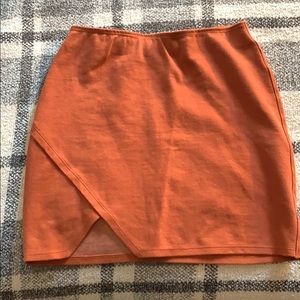 Asymmetrical orange skirt